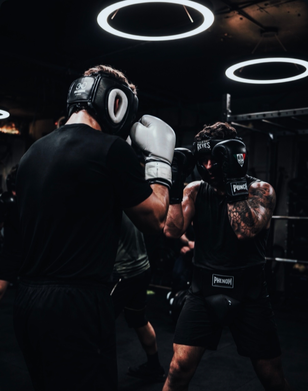 Boxing pad work during training